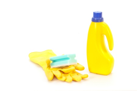Cleaning fluid and yellow goves on a white backgroundの写真素材