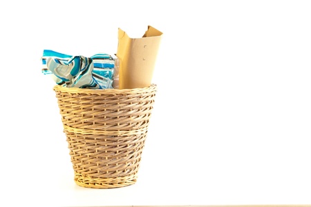 A waste paper bin on a white backgroundの写真素材