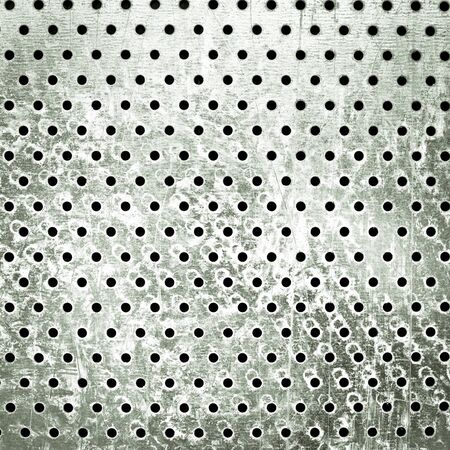 A detailed textured metal background in monochromeの写真素材