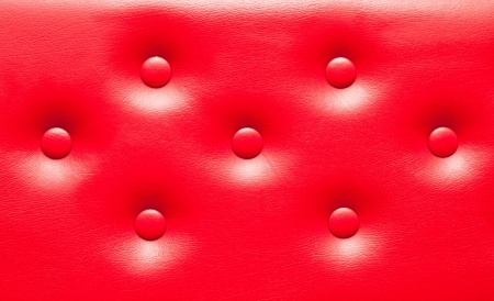 New red leather upholstery as a background imageの写真素材