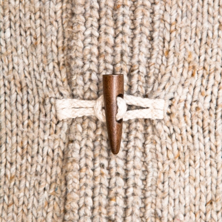 Close up of the toggle on a warm winter jumperの写真素材