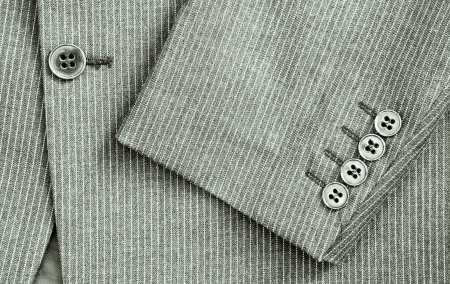 Close up of sleeve and center of a pin stripe suit in black and whiteの写真素材