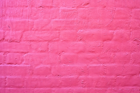 Painted red brick wall as a background imageの写真素材