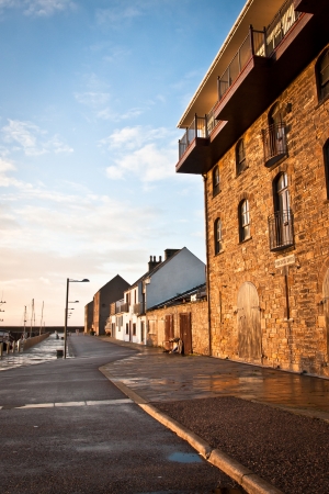 Buildings at Burghead harbour in Scotland in winterの写真素材