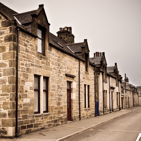 Row of traditional stone houses in a scottish villageの写真素材