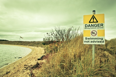 Danger sign at a UK coastal areaの写真素材