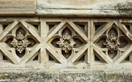 Medieval design in a stone church wallの写真素材