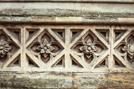 Medieval design in a stone church wallの写真素材