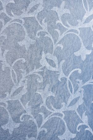 Muted blue textile background with floral patternの写真素材