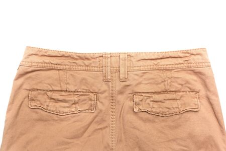 Man's trousers on white background showing rear pocketsの写真素材