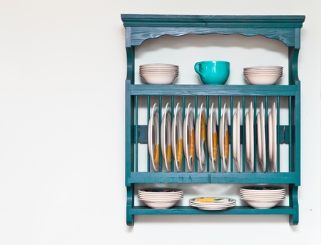 Plate and bowl rack in a cottage kitchenの写真素材