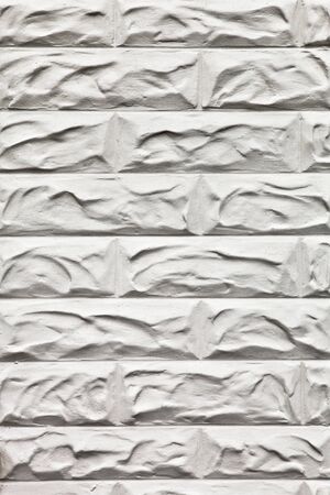 Unusual textured brick wall as a backgroundの写真素材
