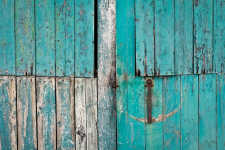 Close up of a weathered blue barn doorの写真素材