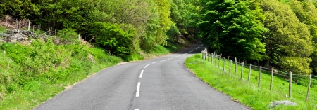 A winding rural road in Northumberland, Englandの写真素材