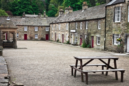 Stone cottages around a courtyard in Blanchland village, Northumberlandの写真素材
