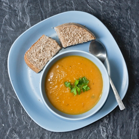 Bowl of freshly made vegetable soup with wholemeal breadの写真素材