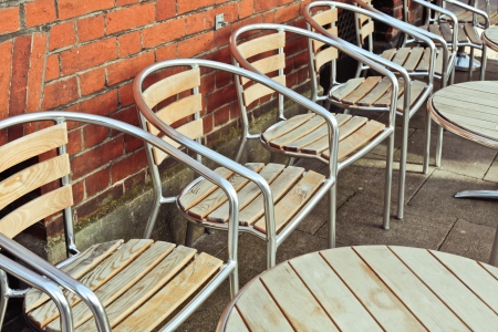 Modern tables and chairs outside a restaurantの写真素材