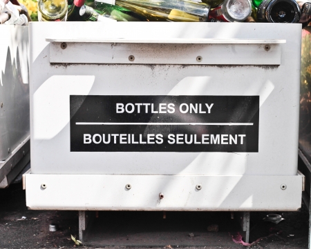A bottle recycling bin at a waste siteの写真素材