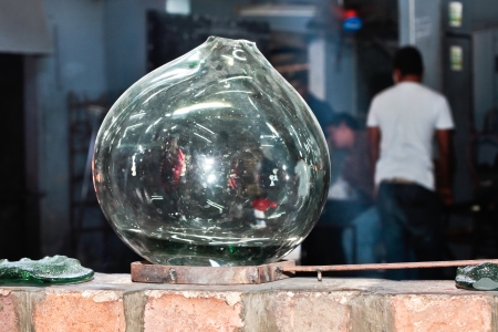 Glass vase in a glass blowing workshopの写真素材