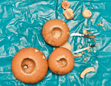 Still life image of pumpkins being carved for Halloweenの写真素材