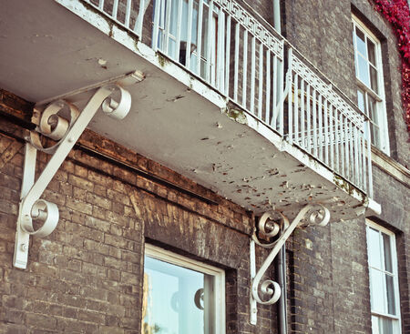 A weathered old fashioned balcony in Englandの写真素材