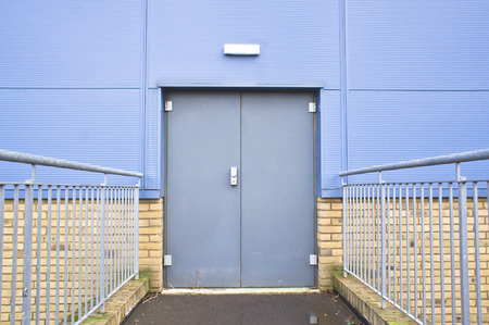 Closed double door in an industrial buildingのeditorial素材