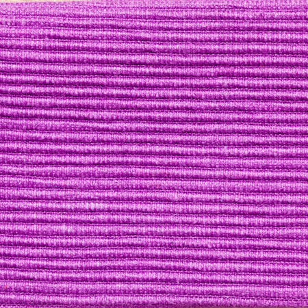 Macro of textured purple fabric as a background