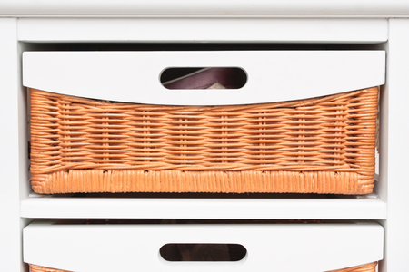 Rattan drawers in a modern drawer cabinetの写真素材
