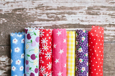 Rolls of colorful patterned fabric