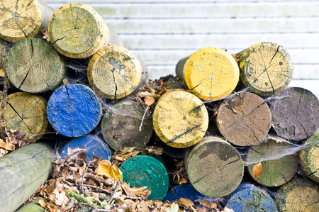 Ends of colorful wood logs used for horse jumpsの写真素材