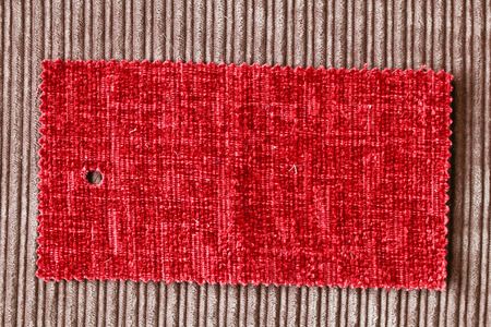 A sample piece of red fabricの写真素材