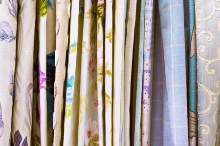 Selection of colorful fabrics as a backgroundの写真素材