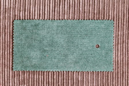 A sample piece of green fabricの写真素材