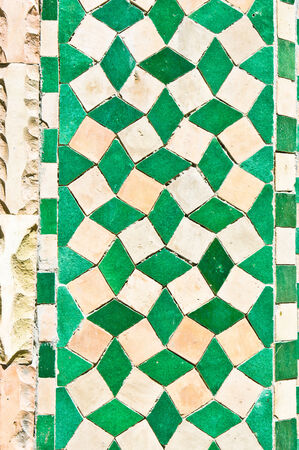 Green and white wall tiles as a backgroundの写真素材
