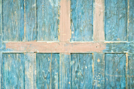 Weathered wooden panel as a backgroundの写真素材