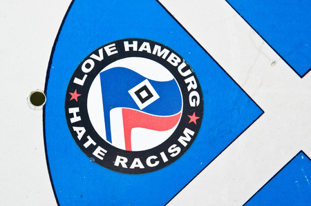 ALONISSON, GREECE - AUGUST 10, 2014: A sticker from a German movement against racism on a suface in Alonissos, Greece.のeditorial素材