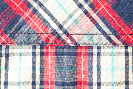 Close up of part of a checked cotton shirt