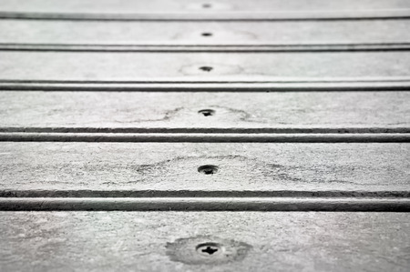 Tope of a wooden table with shallow depth of fieldの写真素材