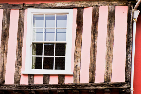 External wall of a traditional enlgish cottage with wood beamsの写真素材