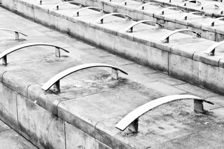 Part of a concrete seating area making an abstract pattern
