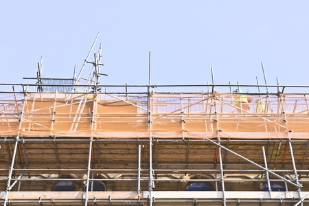 Scaffolding at a construction siteの写真素材