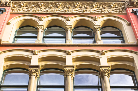 Arch windows on a well maintained building in the UKの写真素材