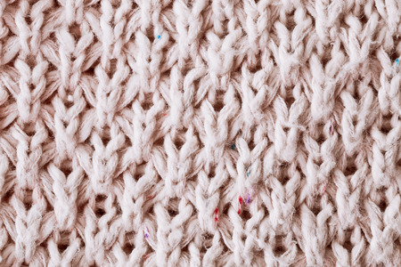 Close up of patterned white knitwear as a a backgroundの写真素材