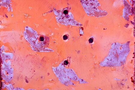 Rusty orange metal surface with water dropsの写真素材