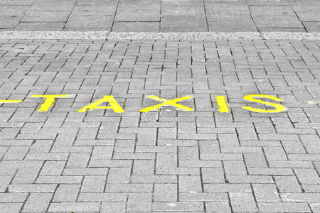 Taxi parking marked on a street in the UKの写真素材