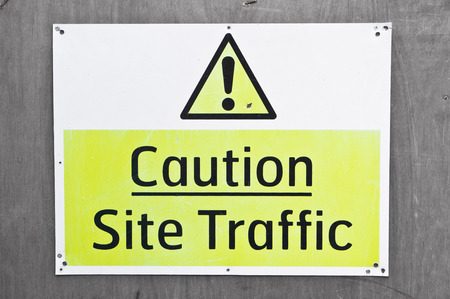 A sign on a building site warning of site trafficの写真素材
