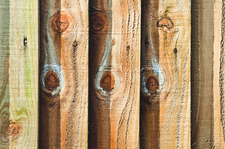Weathered fence panels as a background imageの写真素材