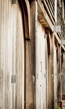 Part of the exterior of a modern wooden barnの写真素材