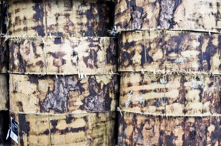 Pile of decorative wooden logs as a background