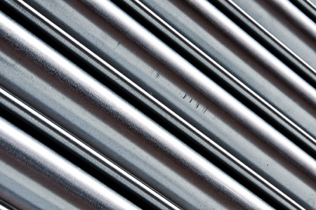 Part of a corrugated metal sheet with a shallow depth of  field, focus in the centreの写真素材